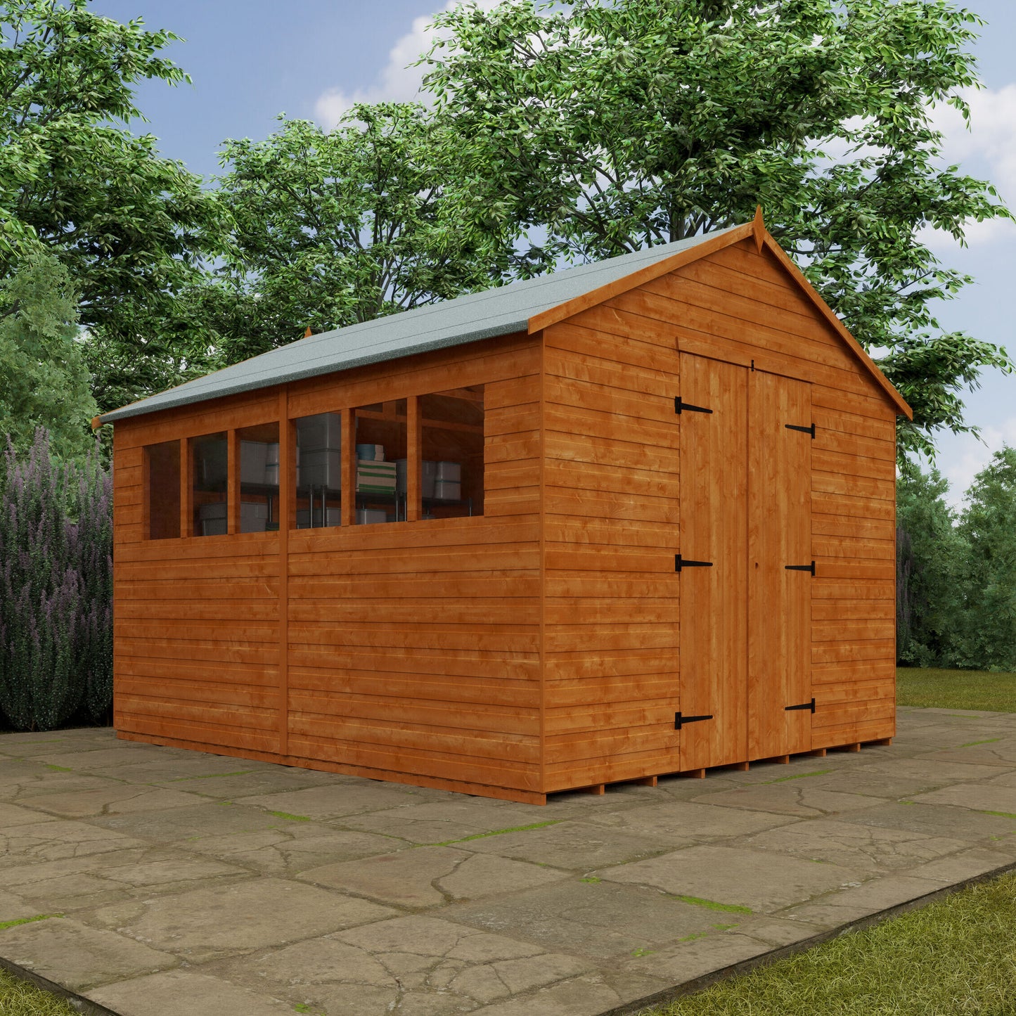 Workstead XL wooden garden workshop with pent roof and double doors in garden setting with trees and lavender in background