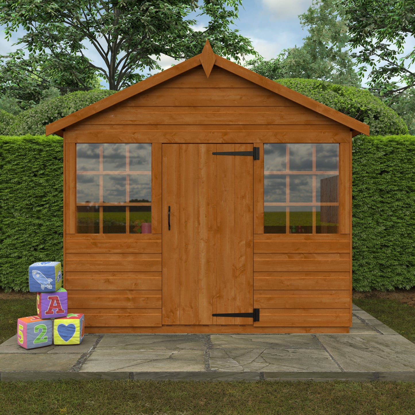 Little Haven wooden children’s playhouse with Georgian windows and children’s blocks on stone patio