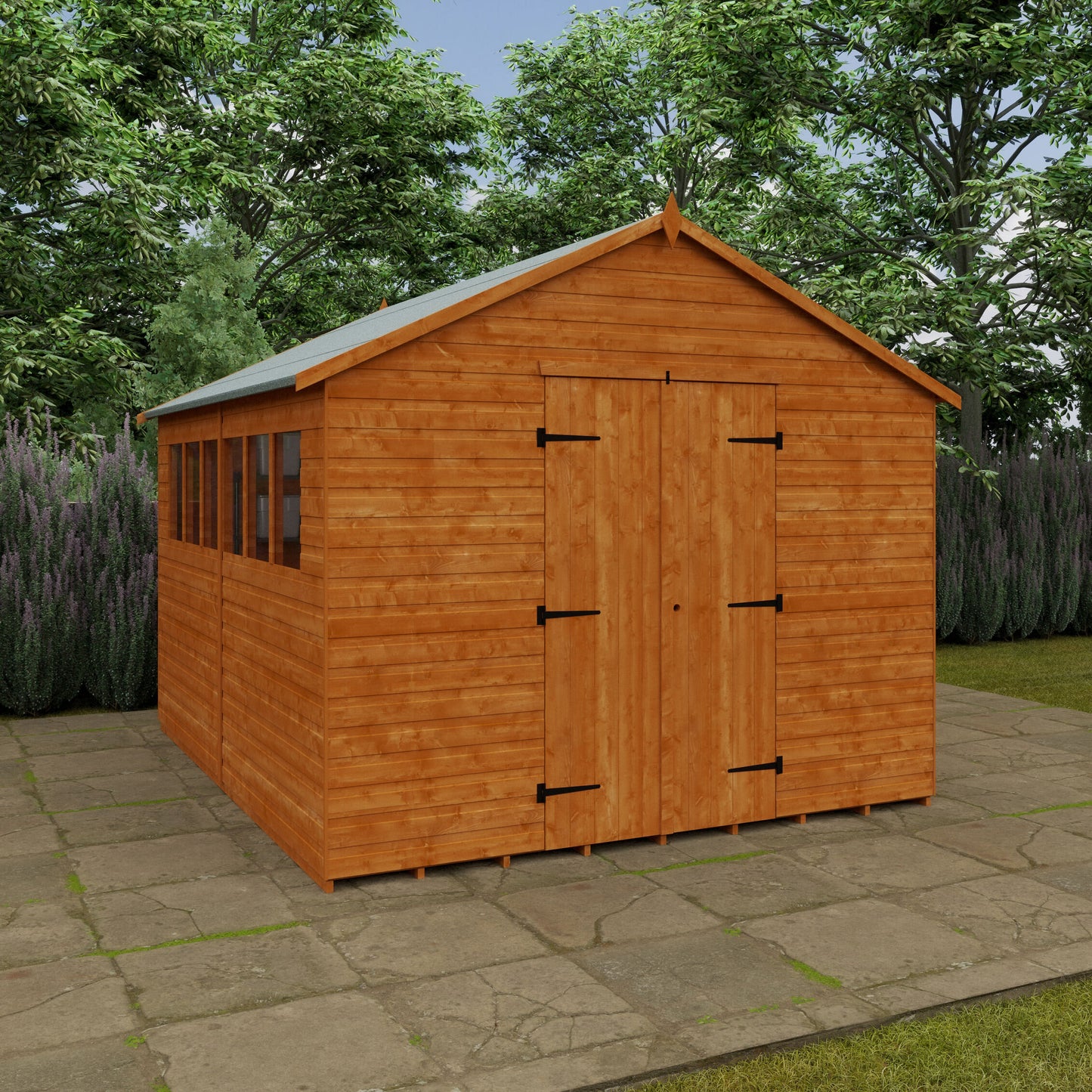 Workstead XL wooden garden workshop with pent roof and double doors in garden setting with trees and lavender in background