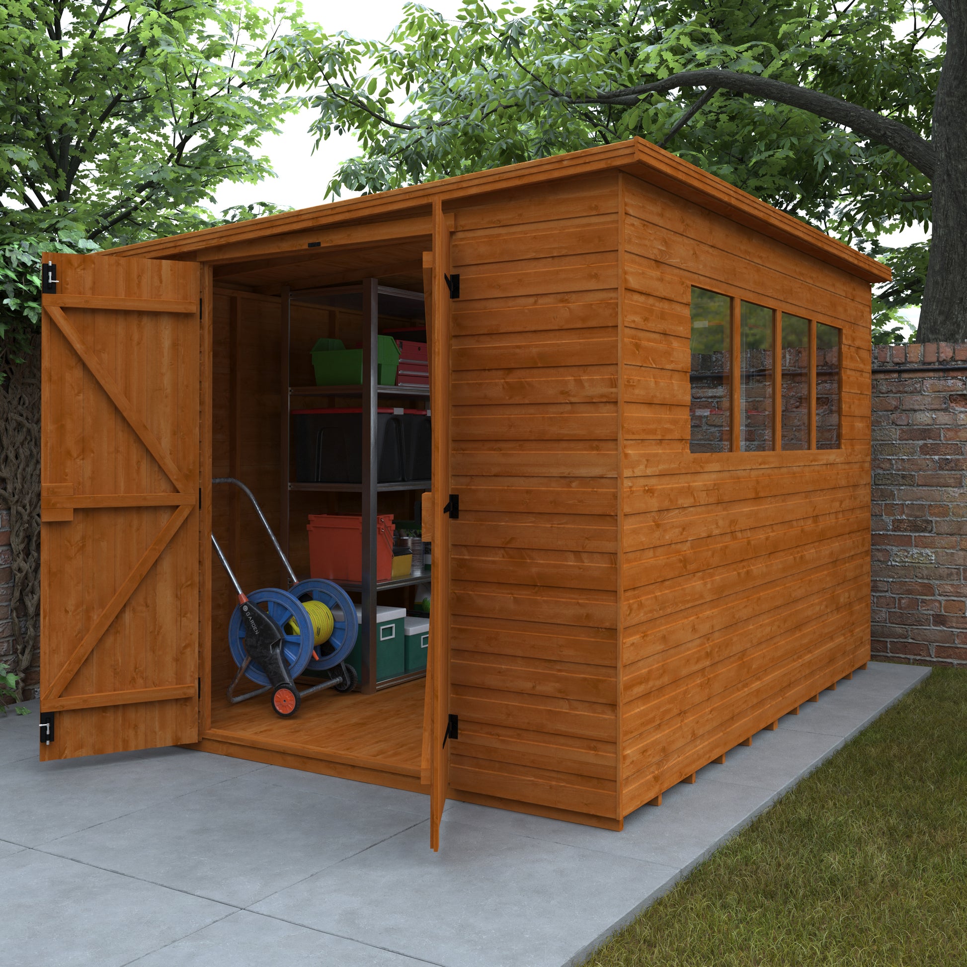 Foundry Studio wooden garden workshop with pent roof, open double doors openshowing shelves and items, surrounded by greenery and brick wall