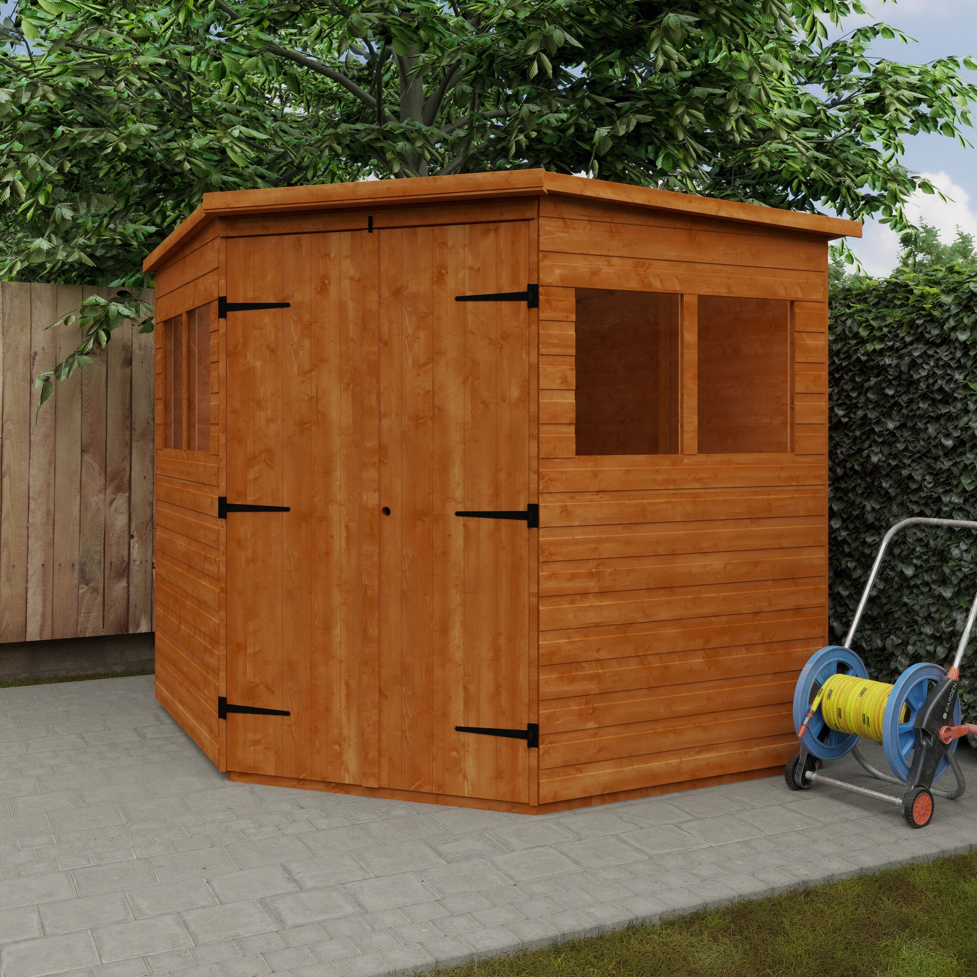 Corner Keeper wooden garden shed with loglap cladding, double doors, and hose reel cart in garden setting