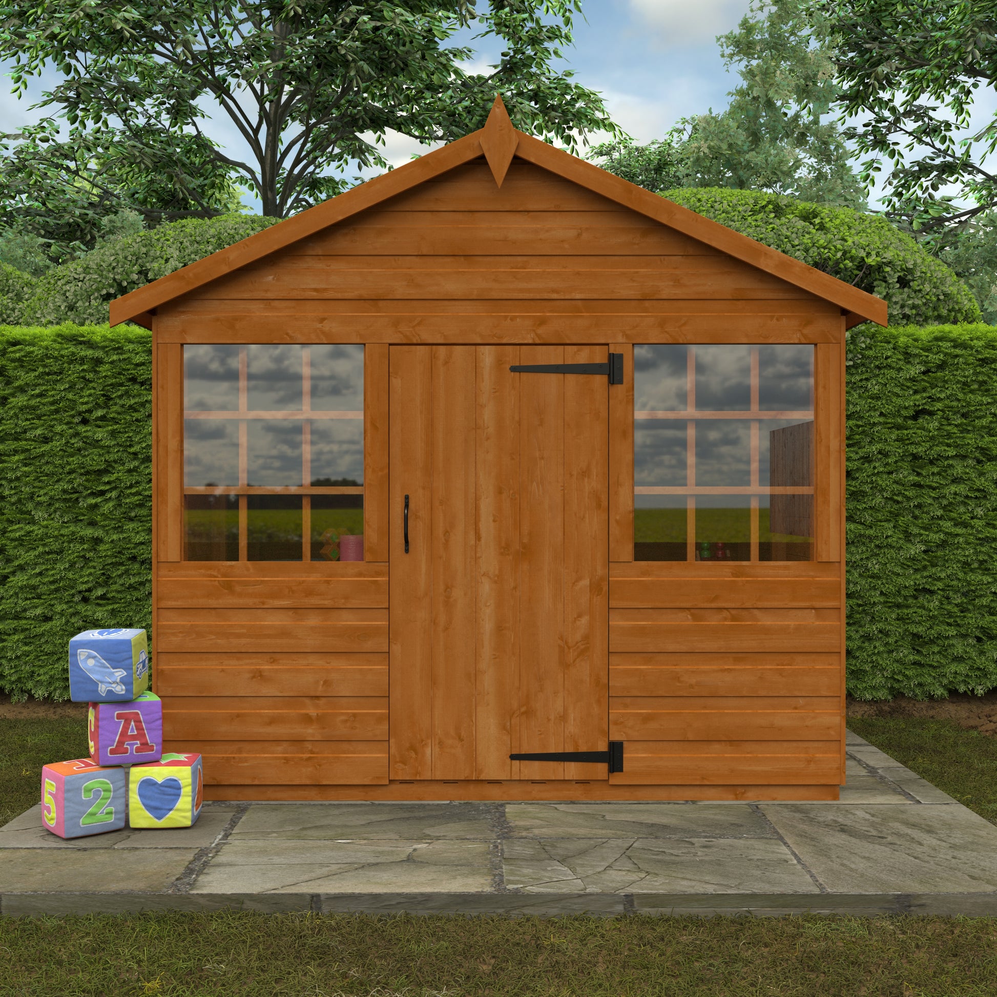 Little Haven wooden children’s playhouse with Georgian windows and children’s blocks on stone patio