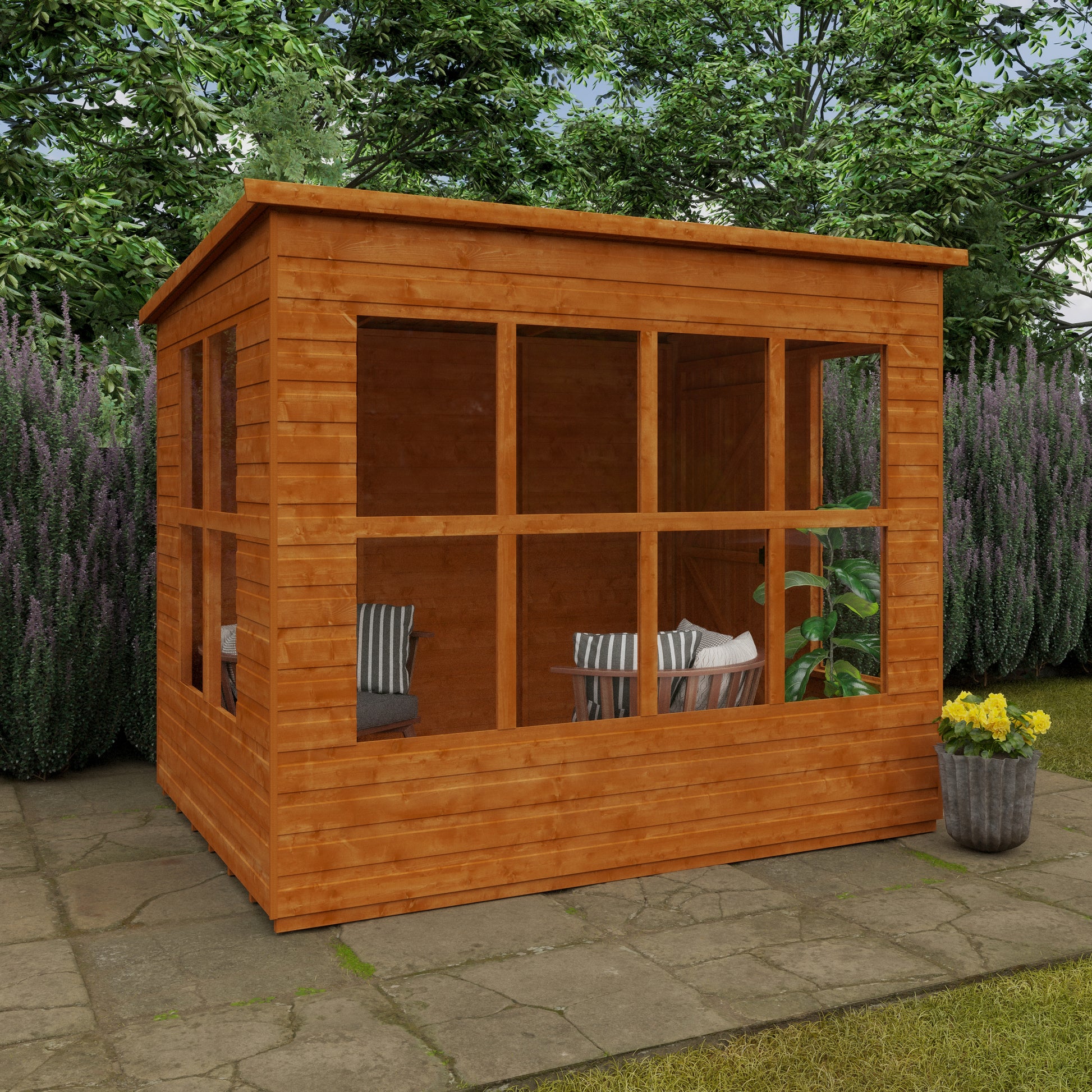 Lookout wooden garden shed with 14 fixed windows, glass panels, and shiplap tongue-and-groove cladding in garden setting